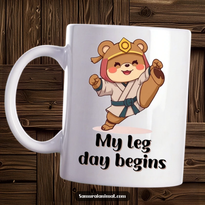Funny mug of a smiling bear dressed as a samurai awkwardly attempting a martial arts high kick, showcasing its clumsy yet determined spirit.
