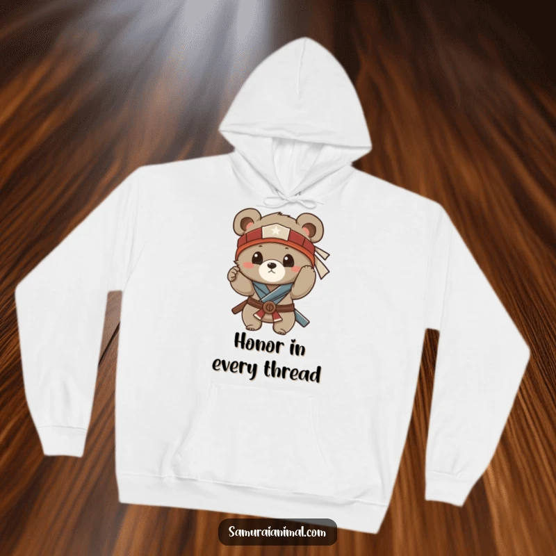 Funny and cozy hoodie with a small bear cub adjusting its samurai headband, perfect for a funny, warm embrace.