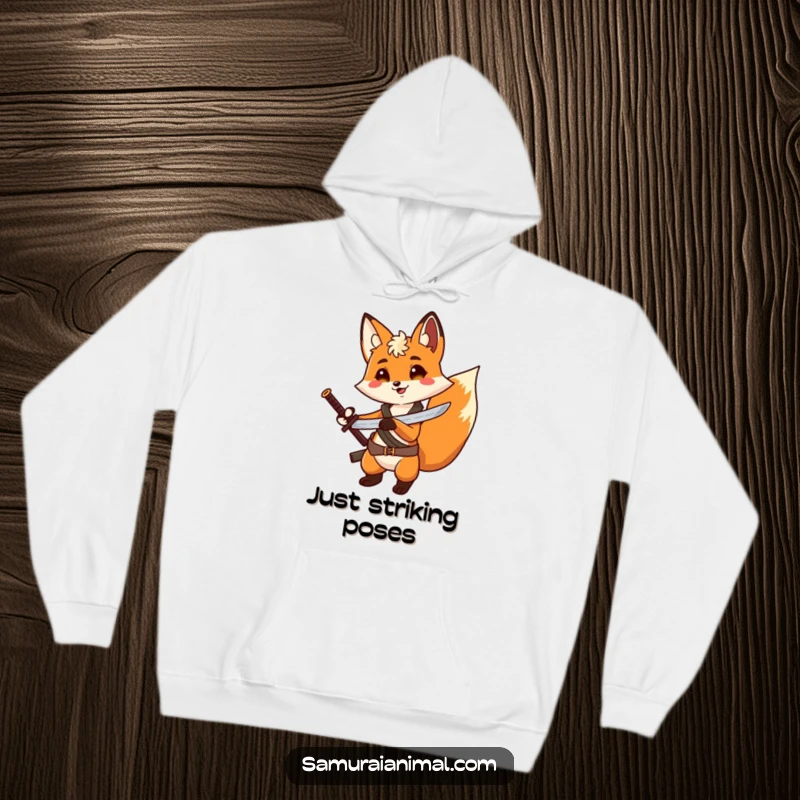 Funny Fox Adventure Hoodie: A warm hoodie depicting a cheerful fox with a tiny sword on its back, posing dramatically.