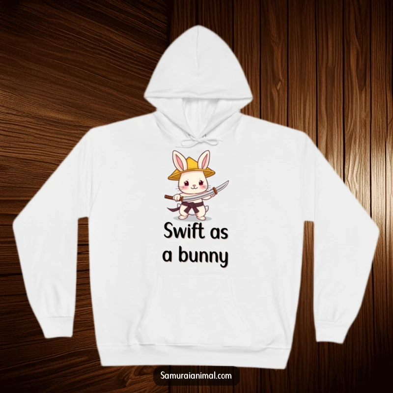 Funny Hoodie depicting a brave tiny bunny wearing a straw hat and gleefully wielding a small katana, ready for any challenge.