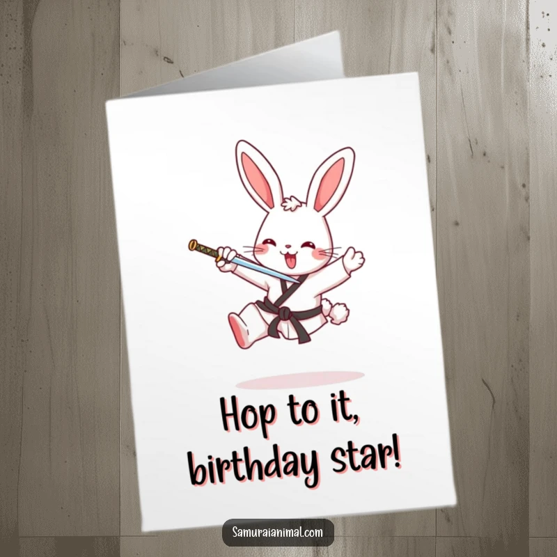 Funny free printable birthday card showing a cheerful bunny executing a dynamic karate kick, celebrating with festive flair.