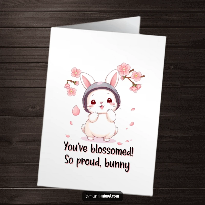 Funny Free Printable Bunny Triumph Card, a cute bunny in a helmet expertly deflects a falling cherry blossom petal.