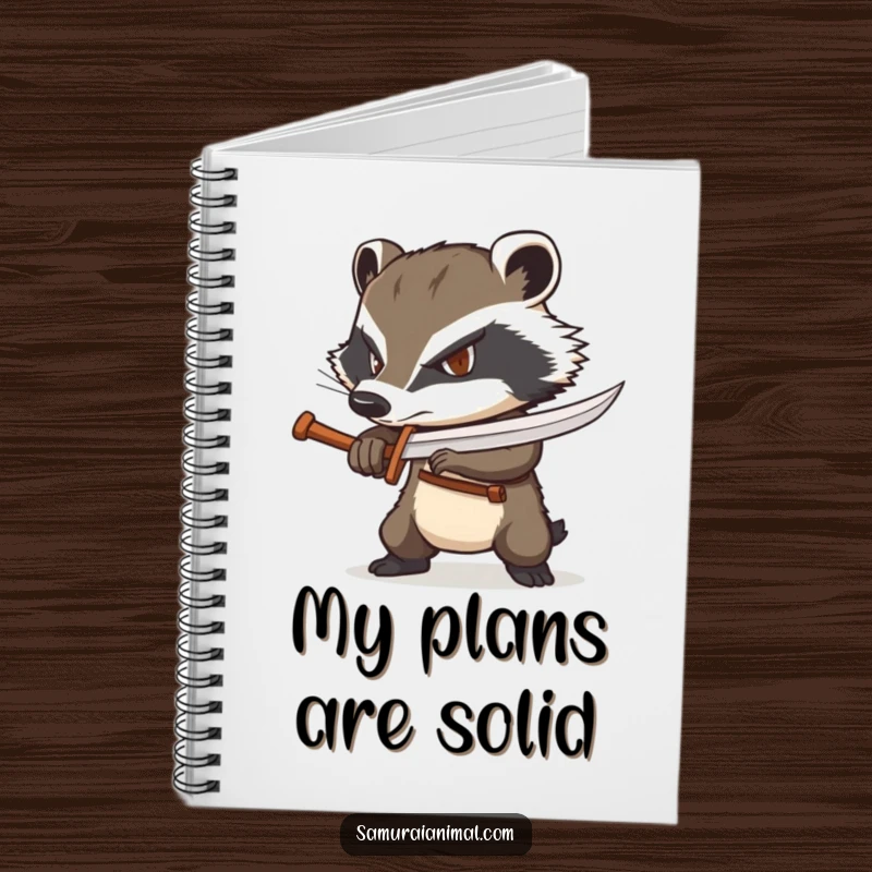 Funny badger notebook featuring a determined badger wielding a tiny wooden sword, perfect for note-taking.