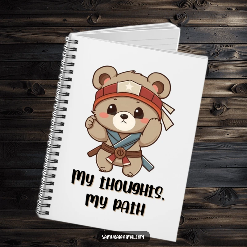Funny notebook featuring a small bear cub adjusting its samurai headband, perfect for jotting down funny thoughts and plans.