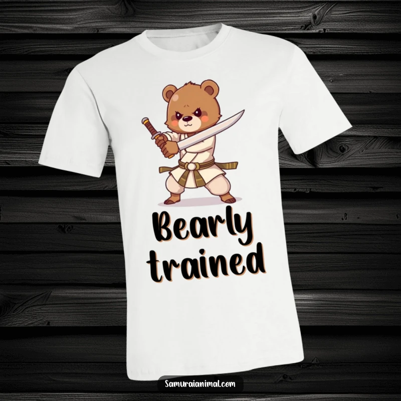 Funny t-shirt depicting a strong bear cub enthusiastically practicing martial arts with a sword, full of playful determination.