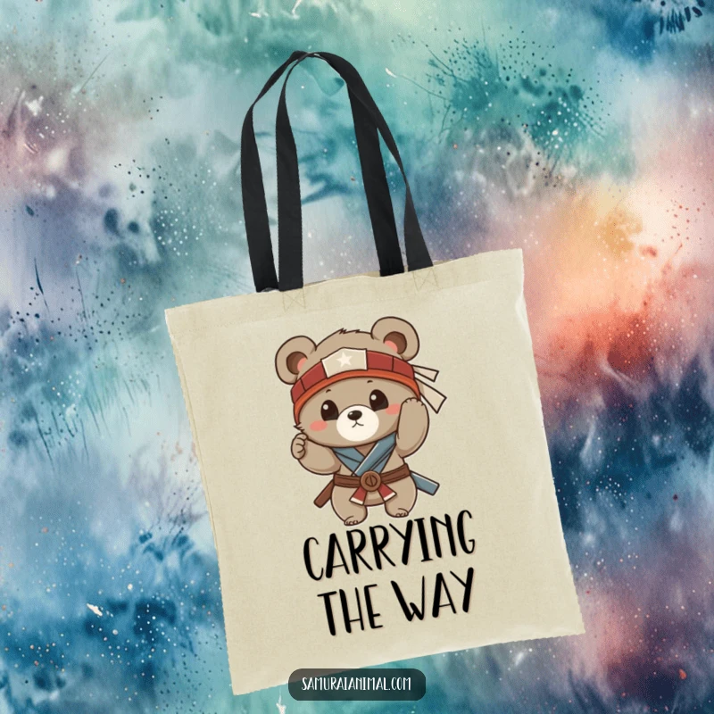 Funny tote bag showcasing a small bear cub adjusting its samurai headband, a funny companion for errands and adventures.