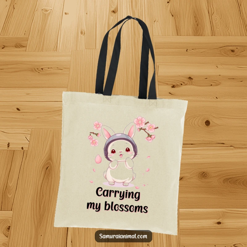 Funny Tote Bag depicting a fluffy bunny in a tiny helmet expertly parrying a falling cherry blossom petal.