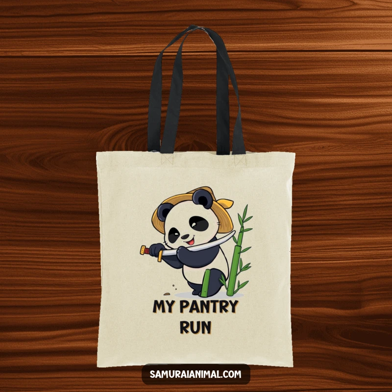 Funny tote bag showing a smiling panda in a straw hat, wielding a tiny katana to chop bamboo with great effort.